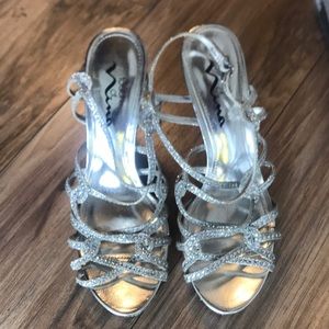 Touch of Nina silver shiny heels .